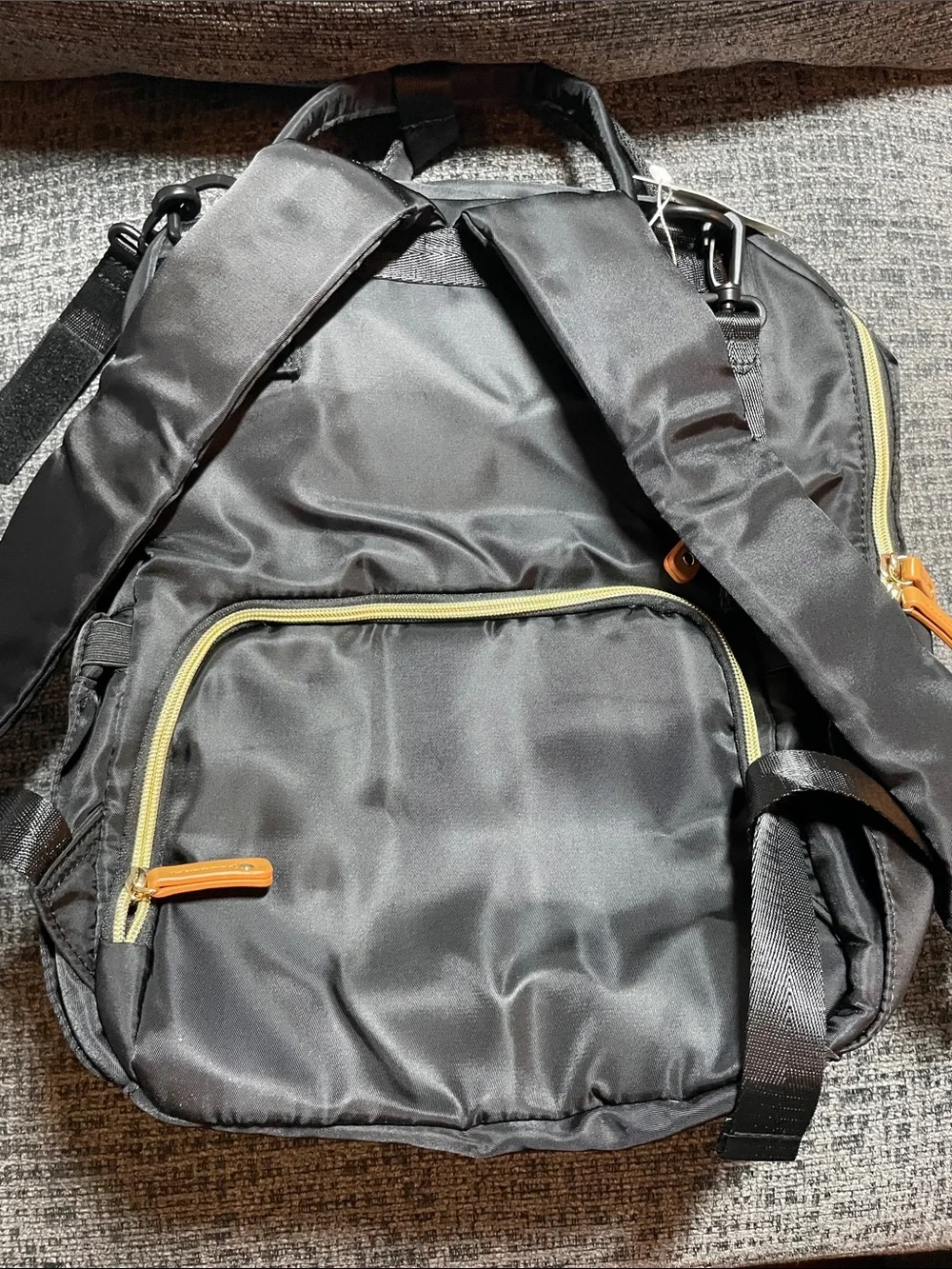 Classic Black Baby Bag Backpack with Tan Accents